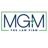 MG INTERNATIONAL INC logo